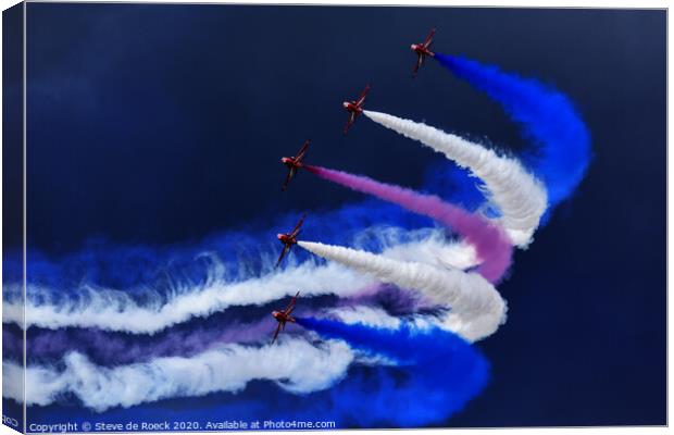 Red Arrows Trailing Smoke In A Stormy Sky. Canvas Print by Steve de Roeck