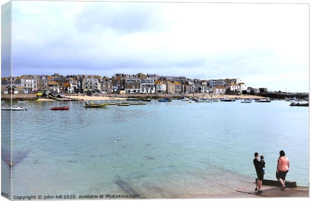 High tide at St. Ives harbour Cornwall.  Canvas Print by john hill