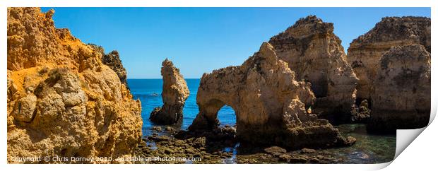 Grotto at Ponta da Piedade in the Algarve Print by Chris Dorney