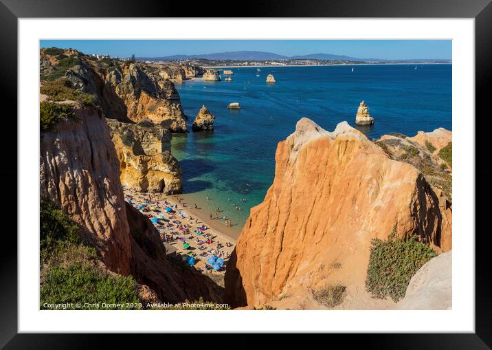 Praia do Camilo in the Algarve Framed Mounted Print by Chris Dorney