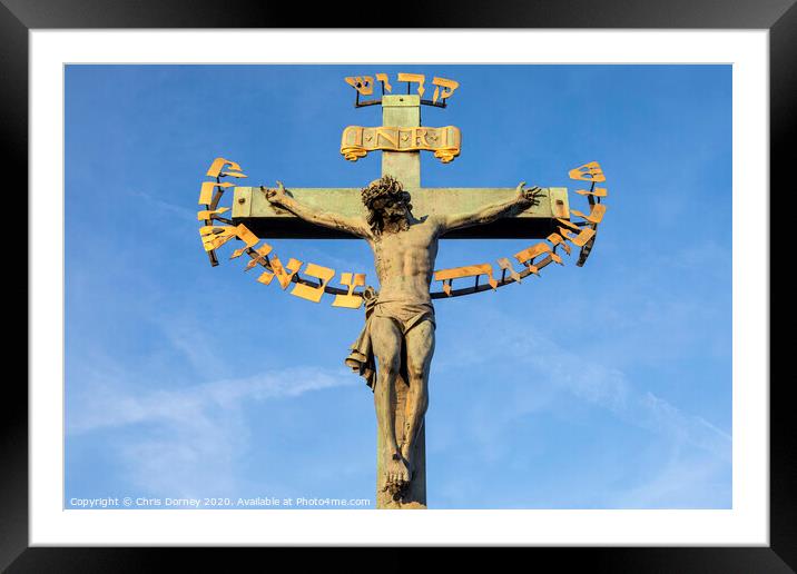 Crucifix on the Chales Bridge in Prague Framed Mounted Print by Chris Dorney