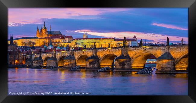 Prague Castle and the Charles Bridge Framed Print by Chris Dorney