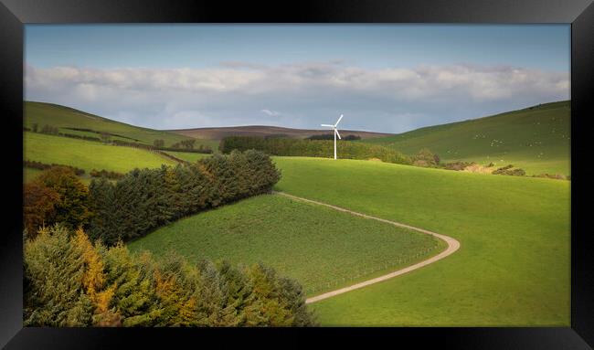 A solitary wind turbine Framed Print by Leighton Collins