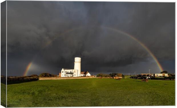 A rainbow over the old lighthouse  Canvas Print by Gary Pearson