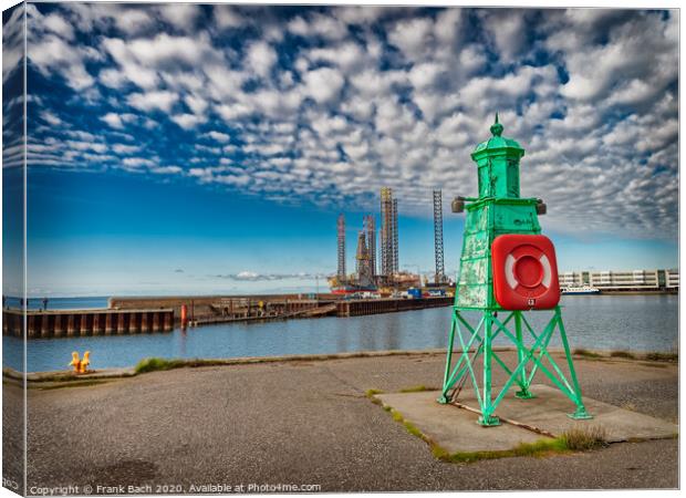 Retro lighthouse at the entrance to Esbjerg harbor, Denmark Canvas Print by Frank Bach