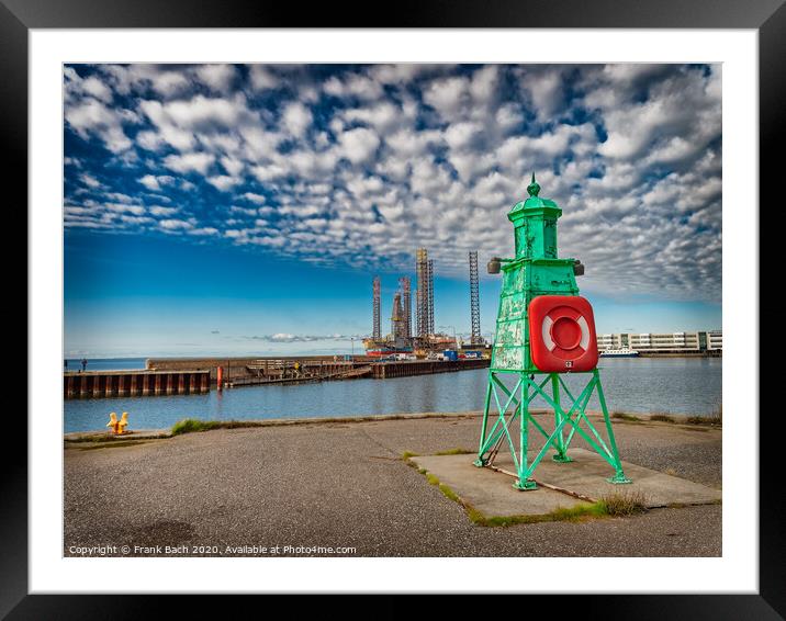 Retro lighthouse at the entrance to Esbjerg harbor, Denmark Framed Mounted Print by Frank Bach