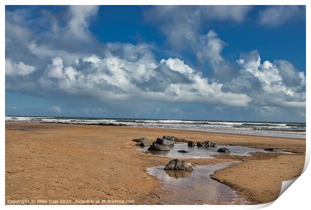 Rocks on a Sandy Beach Print by Mike Dale