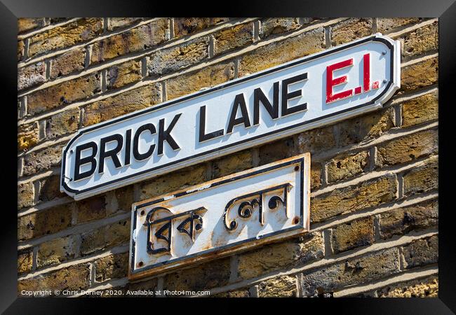 Brick Lane in London Framed Print by Chris Dorney