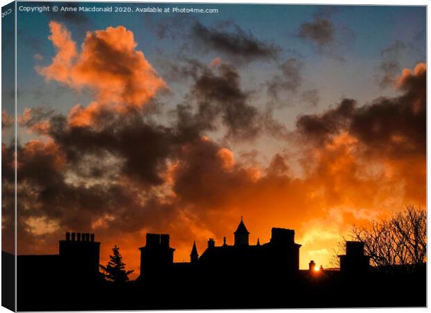 Fiery Sunset Over The Rooftops Of Lerwick, Shetlan Canvas Print by Anne Macdonald