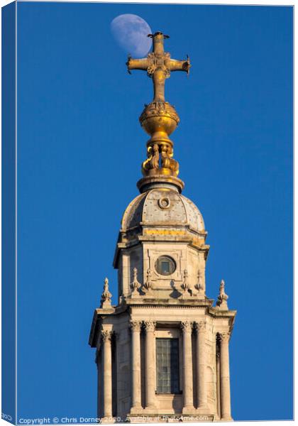 The Moon and St. Pauls Cathedral in London Canvas Print by Chris Dorney