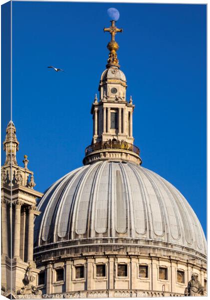The Moon Perched on St. Pauls Catehdral Canvas Print by Chris Dorney