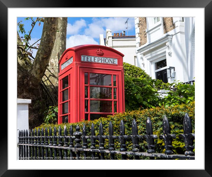 Red Telephone Box in London Framed Mounted Print by Chris Dorney