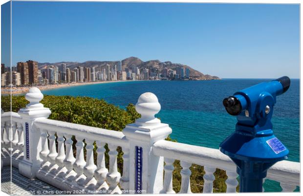 View of Benidorm from Placa del Castell Canvas Print by Chris Dorney