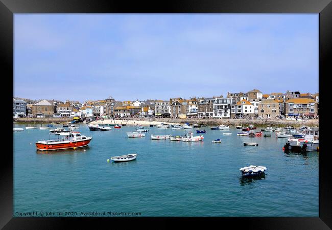 The beautiful seafront view from the harbour at St. Ives in Cornwall. Framed Print by john hill