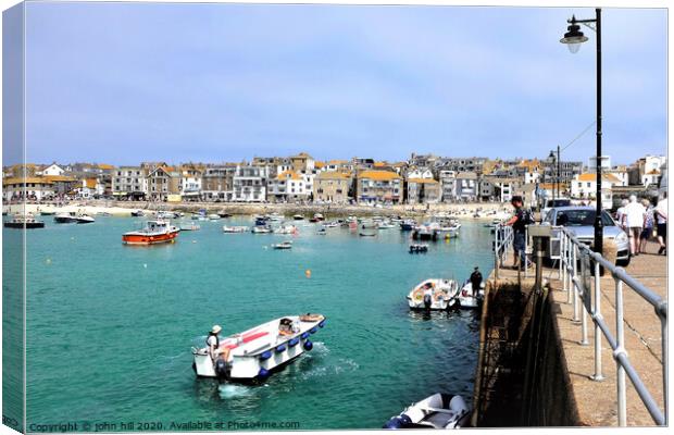 Beautiful harbour and town of St. Ives in Cornwall. Canvas Print by john hill