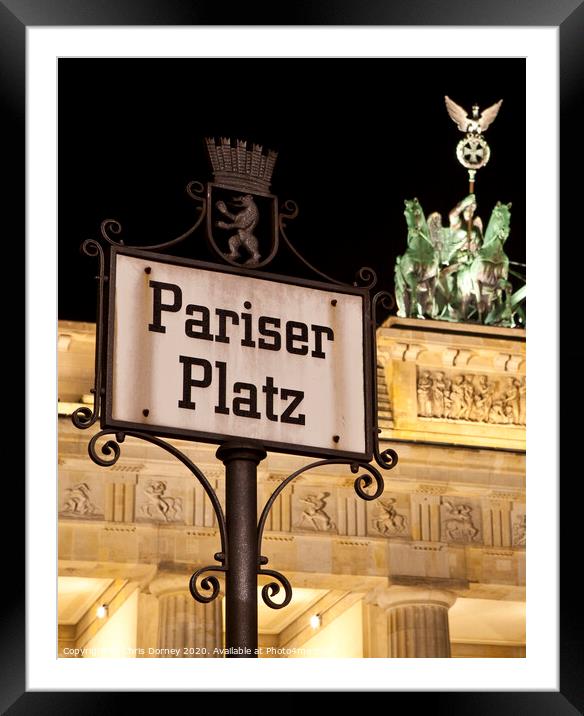 Pariser Platz Street Sign and the Brandenburg Gate Framed Mounted Print by Chris Dorney