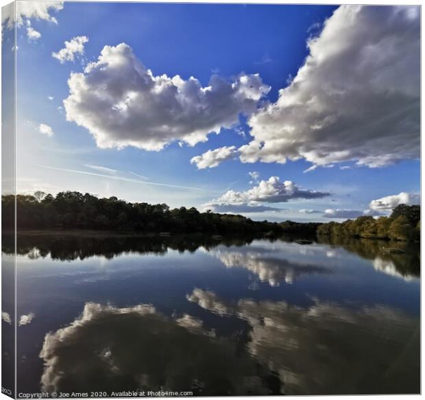 Cloud reflections  Canvas Print by Joe Ames