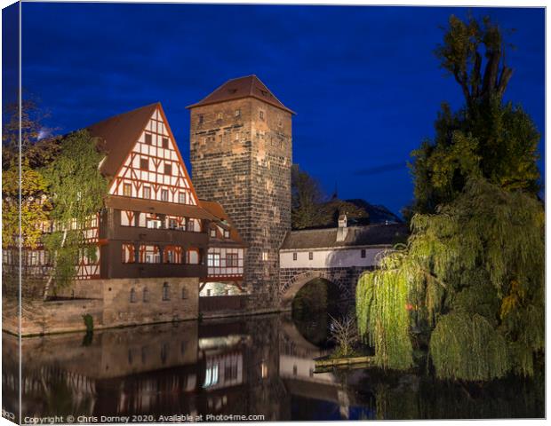 Weinstadel House and Pegnitz River in Nuremberg Canvas Print by Chris Dorney