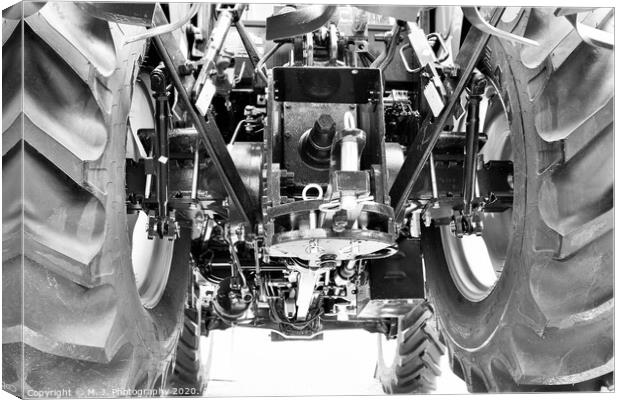A close up of Farm Tractors with engine Canvas Print by M. J. Photography