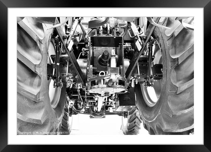 A close up of Farm Tractors with engine Framed Mounted Print by M. J. Photography