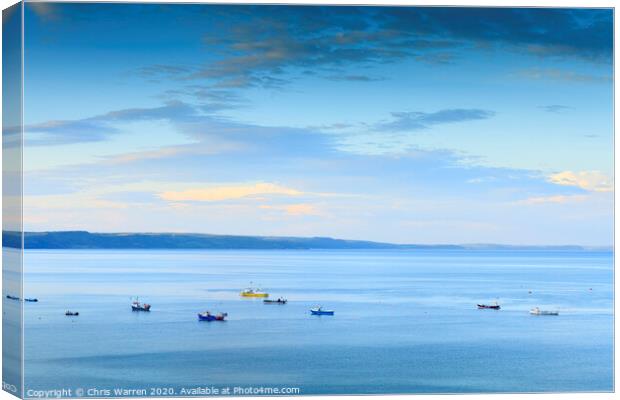 Boats moored in the bay Canvas Print by Chris Warren