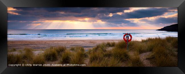 Sun rays at Freshwater West Framed Print by Chris Warren