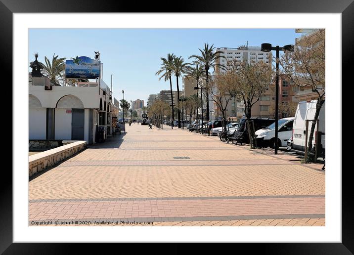 Paseo Maritimo promenade in March at Fuengirola spain. Framed Mounted Print by john hill
