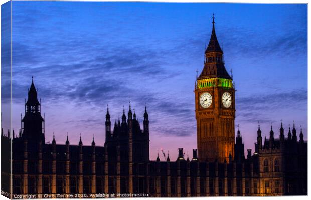 Houses of Parliament in London at Dusk Canvas Print by Chris Dorney