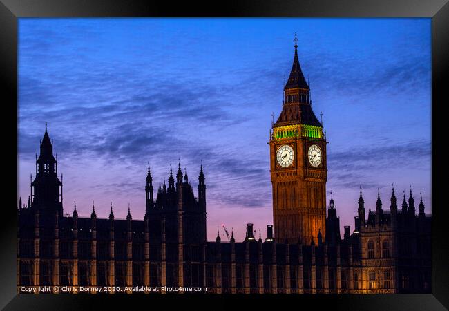 Houses of Parliament in London at Dusk Framed Print by Chris Dorney