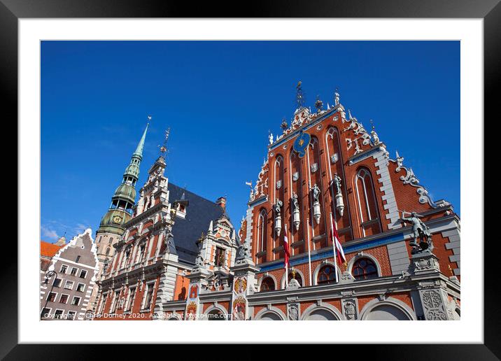 House of the Blackheads and St. Peter's Church in Riga Framed Mounted Print by Chris Dorney