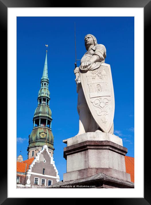 St. Roland Statue and St. Peter's Church in Riga Framed Mounted Print by Chris Dorney
