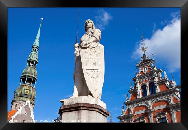 House of the Blackheads, St. Peter's Church and Saint Roland Statue in Riga Framed Print by Chris Dorney