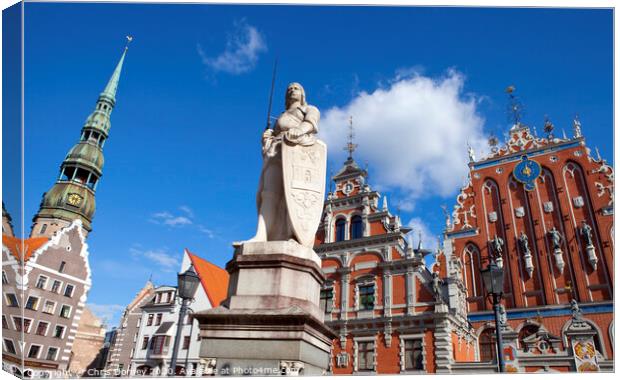 House of the Blackheads, St. Peter's Church and Saint Roland Statue in Riga Canvas Print by Chris Dorney