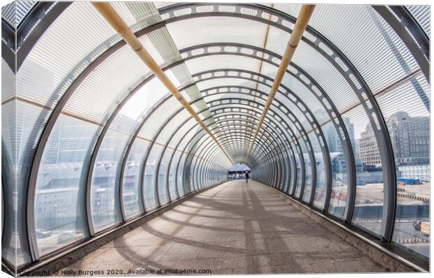 Glass walk way tunnel London  Canvas Print by Holly Burgess