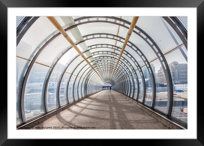 Glass walk way tunnel London  Framed Mounted Print by Holly Burgess