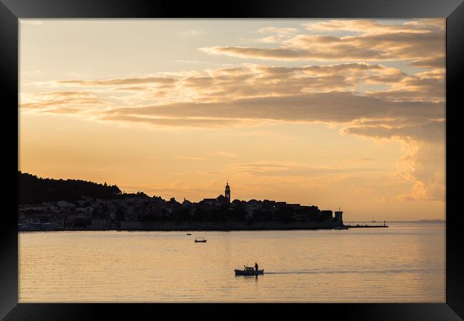 Fisherman in front of Korcula old town Framed Print by Jason Wells