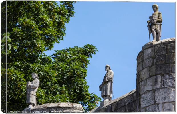 Sculptures on Bootham Bar in York Canvas Print by Chris Dorney
