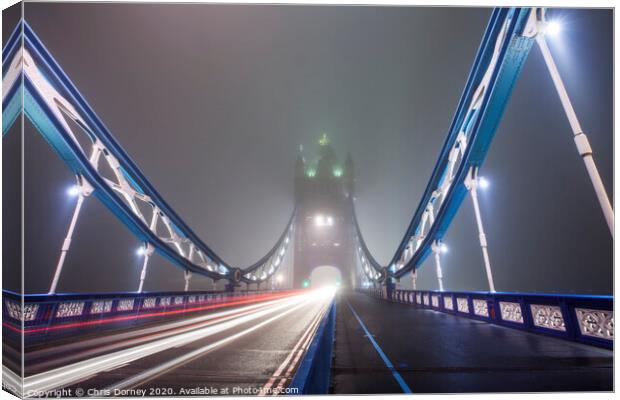 Foggy Tower Bridge Canvas Print by Chris Dorney