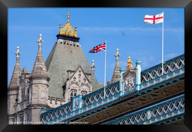 Flags on Tower Bridge in London Framed Print by Chris Dorney
