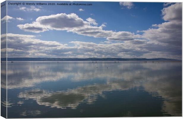 Cloud reflections on West Kirby Beach Canvas Print by Wendy Williams CPAGB