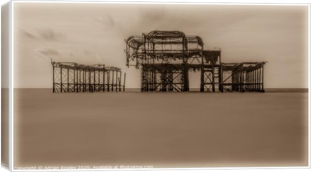 West Pier, Brighton in Sepia Canvas Print by Adrian Rowley