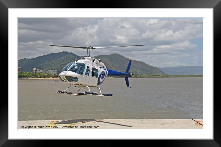 helicopter landing on pontoon Framed Mounted Print by chris hyde