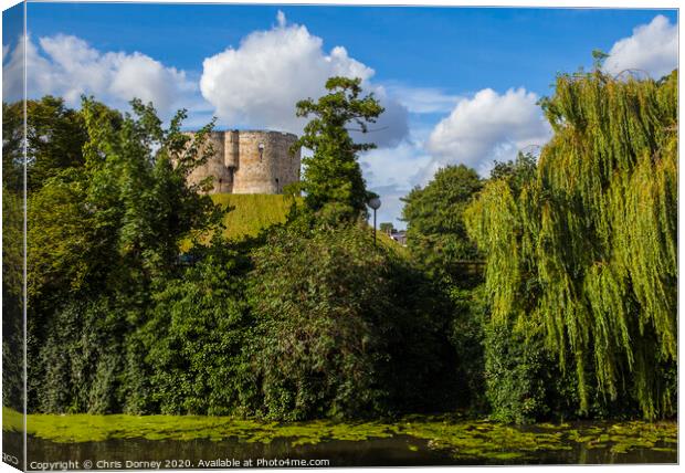 Clifford's Tower and the River Ouse in York Canvas Print by Chris Dorney