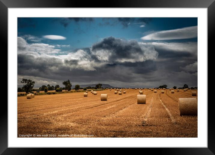 Angry skies Framed Mounted Print by kevin cook