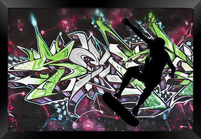 Skateboarder on colour graffiti background Framed Print by Dawn O'Connor