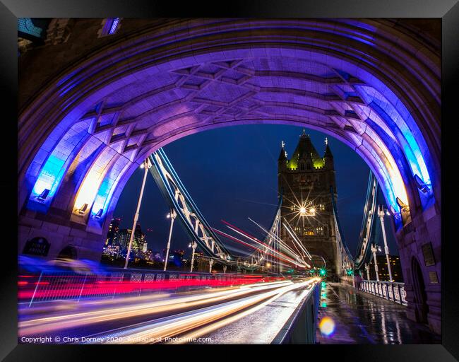 Light Trails on Tower Bridge in London Framed Print by Chris Dorney