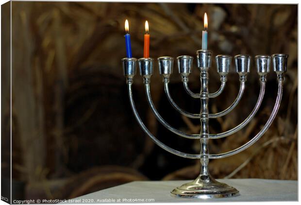 Chanukia with 3 candles for day 2 Canvas Print by PhotoStock Israel