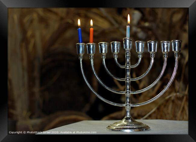 Chanukia with 3 candles for day 2 Framed Print by PhotoStock Israel