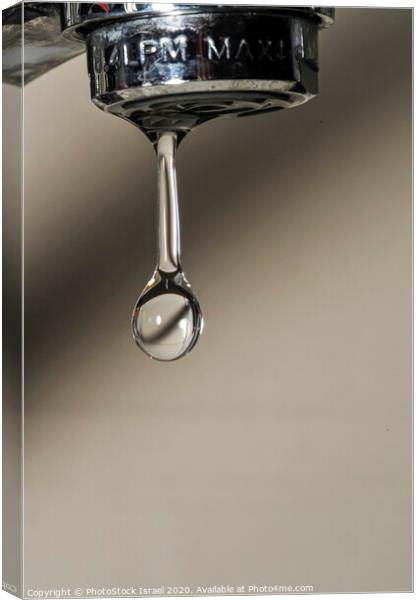 Water dripping from a tap Canvas Print by PhotoStock Israel