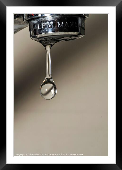 Water dripping from a tap Framed Mounted Print by PhotoStock Israel